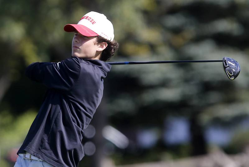 McHenry’s Alex LaShelle watches his tee shot on the second hole during the Fox Valley Conference Boys Golf Tournament Thursday, Sept. 25, 2025, at Foxford Hills Golf Club in Cary.