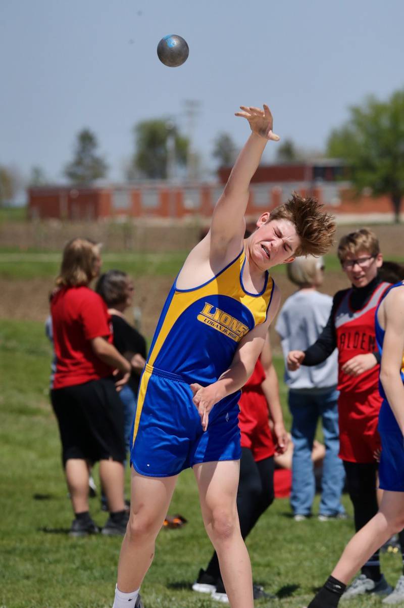 Logan's Jayden Cook throws the shot in the Bureau County Junior High School track meet.