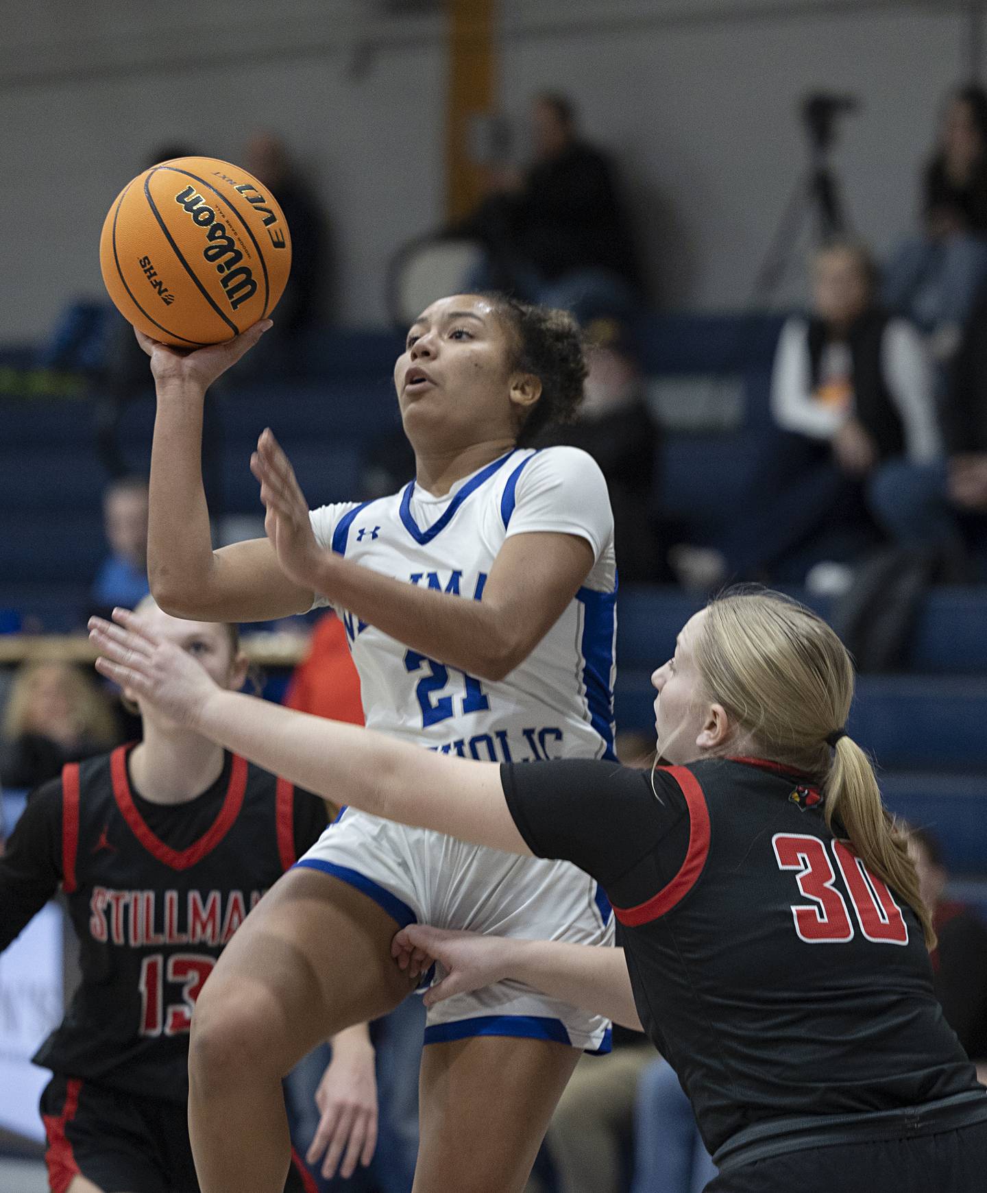 Newman’s Gisselle Martin puts up a shot against Stillman Valley’s Alyvia Bagg Monday, Feb. 2, 2026.
