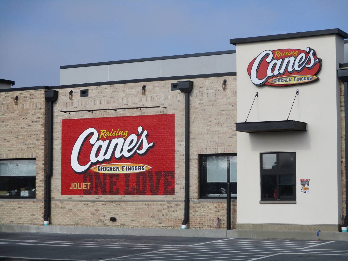 The drive-thru lane is seen at the Raising Cane's Chicken Fingers, which is scheduled to open March 8, 2022 at 3000 Plainfield Road in Joliet.