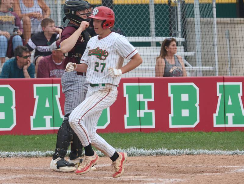 L-P's Grey Ernat scores a run against Morris on Friday, April 17, 2026 at Huby Sarver Field in the L-P Athletic Complex in La Salle.