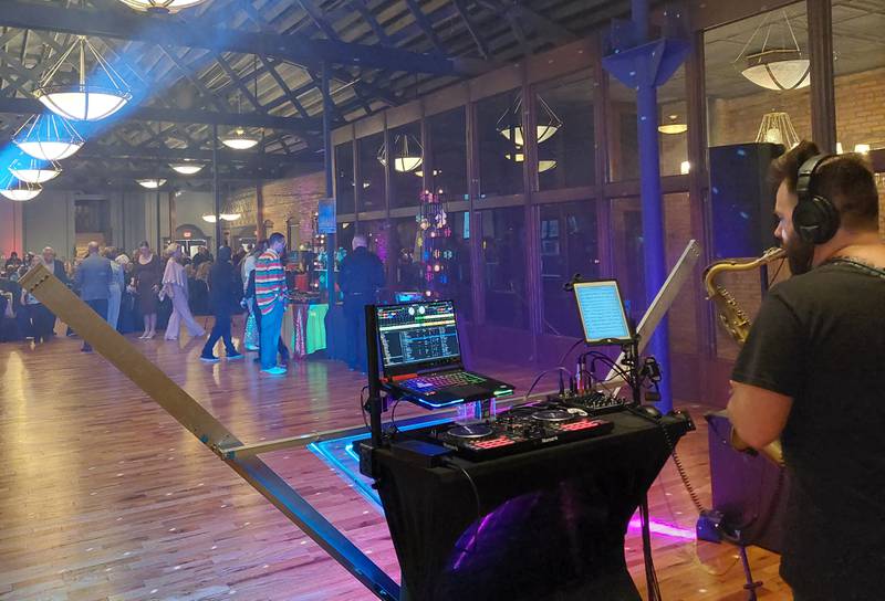 DJ and saxophonist Lucas Sanor performs Saturday, Nov. 4, 2023, during the Starved Rock Country Community Foundation's Disco Ball.