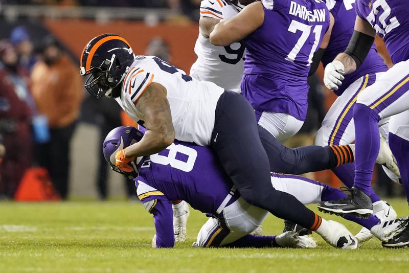 Chicago Bears defensive end Akiem Hicks sacks Minnesota Vikings quarterback Kirk Cousins during the first half Monday, Dec. 20, 2021, in Chicago.