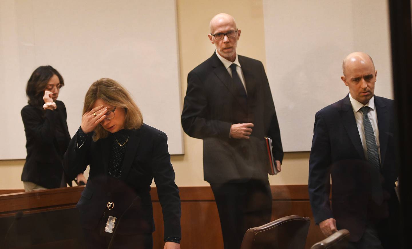 Ogle County State's Attorney Victim/Witness Advocate Marisol Esparza, Assistant State's Attorney Allison Huntley, Ogle County State's Attorney Mike Rock, and Assistant State's Attorney Matthew Leisten enter the courtroom to hear verdicts in the Duane "DC" Meyer muder-arson trial on Thursday, Jan. 29, 2026 at the Ogle County Judicial Center in Oregon.