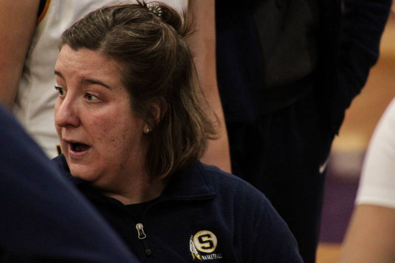 Sterling girls basketball coach Taylor Jackson talks to her players in a first-quarter huddle on Wednesday at the Dixon KSB Holiday Classic.