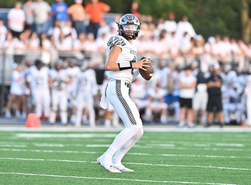 Minooka's Zane Caves looks to throw a pass during a non-conference game against Joliet Central on Friday, Sep 13, 2024 at Joliet. (Dean Reid for Shaw Local News Network)