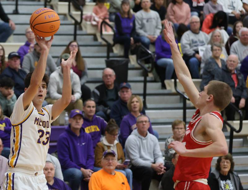 Mendota's Dane Doyle shoots a jump shot over Ottawa's Lucas Farabaugh on Tuesday, Jan. 6, 2026 at Mendota High School.