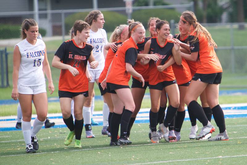 St Charles East celebrates scoring a goal against Wheaton North at the Class 3A Regional Final in Wheaton on May 20,2022.