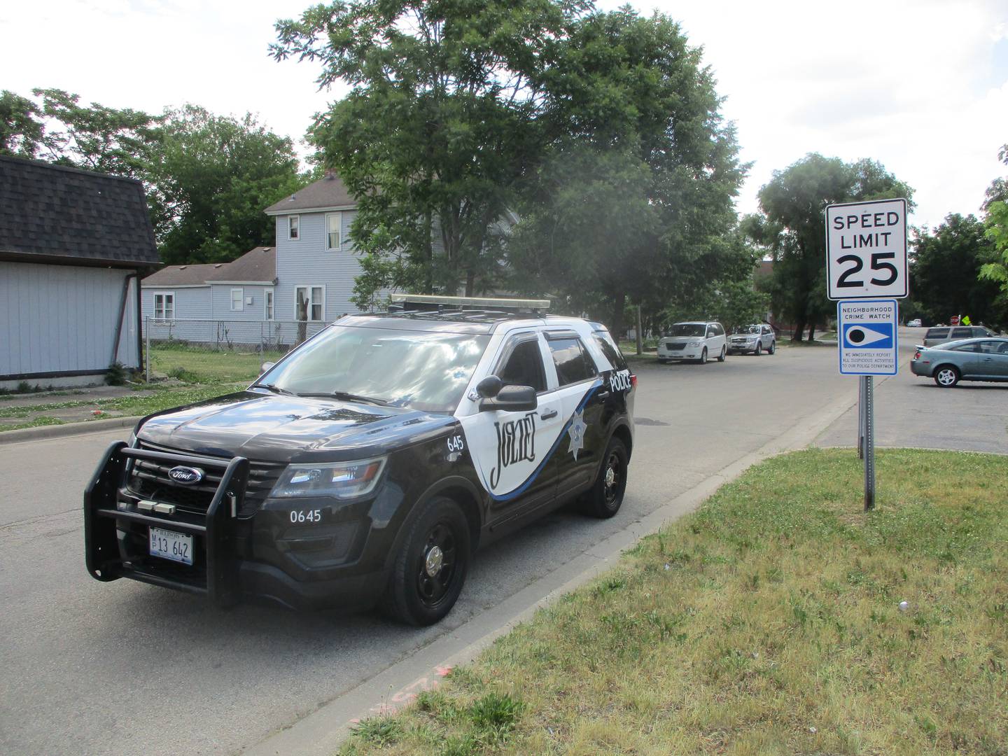 A Joliet police squad car is parked Wednesday, May 31, 2023, on South Joliet Street in the vicinity of a shooting that killed a 16-year-old on Tuesday night.