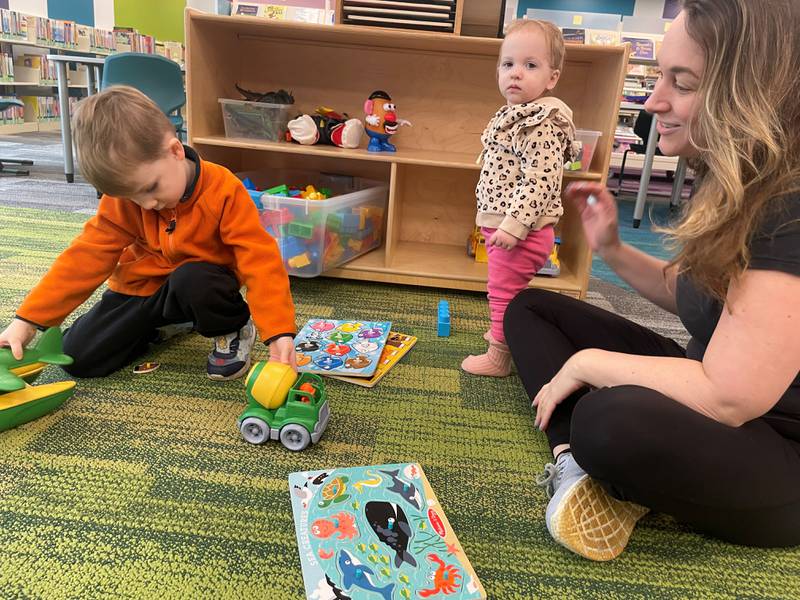 The Redshaw family visits the Algonquin Area Public Library Eastgate branch's new youth services area following an extensive renovation. From left are Ryder, 3, Talulah, 1, and Liana.
