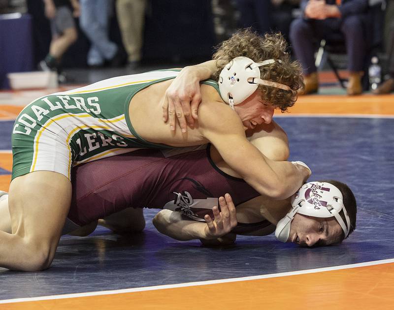 Coal City’s Cody Widlowski controls Taylor Finley of Unity Christian in the 138 pound weight class of the 1A state individual wrestling finals Saturday, Feb. 22, 2025, at State Farm Center in Champaign.