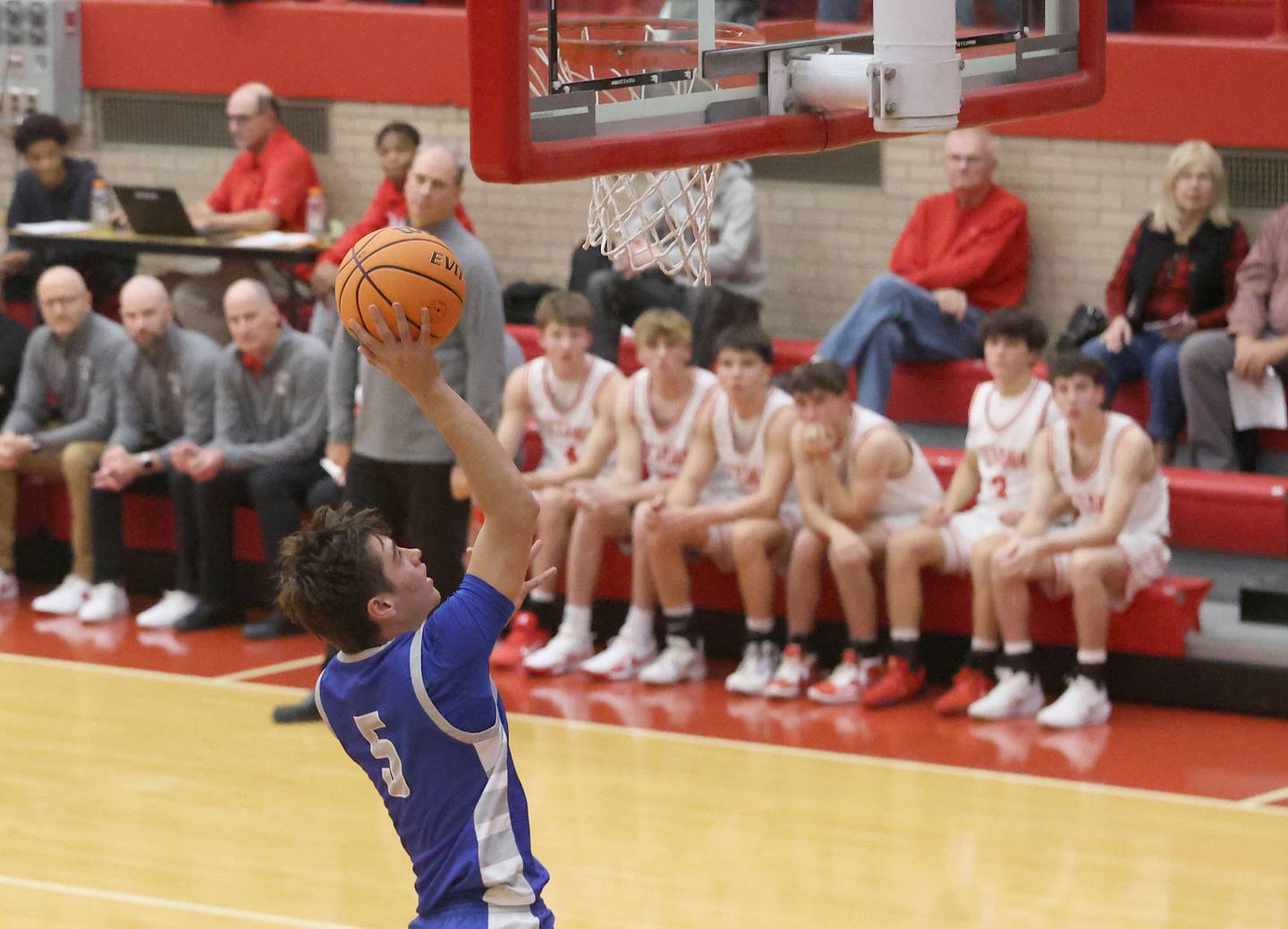 Princeton's Jack Oester runs in all alone to score on a layup against Ottawa during the Dean Riley Shootin' The Rock Thanksgiving Tournament on Monday Nov. 24, 2025 in Kingman Gymnasium at Ottawa High School.