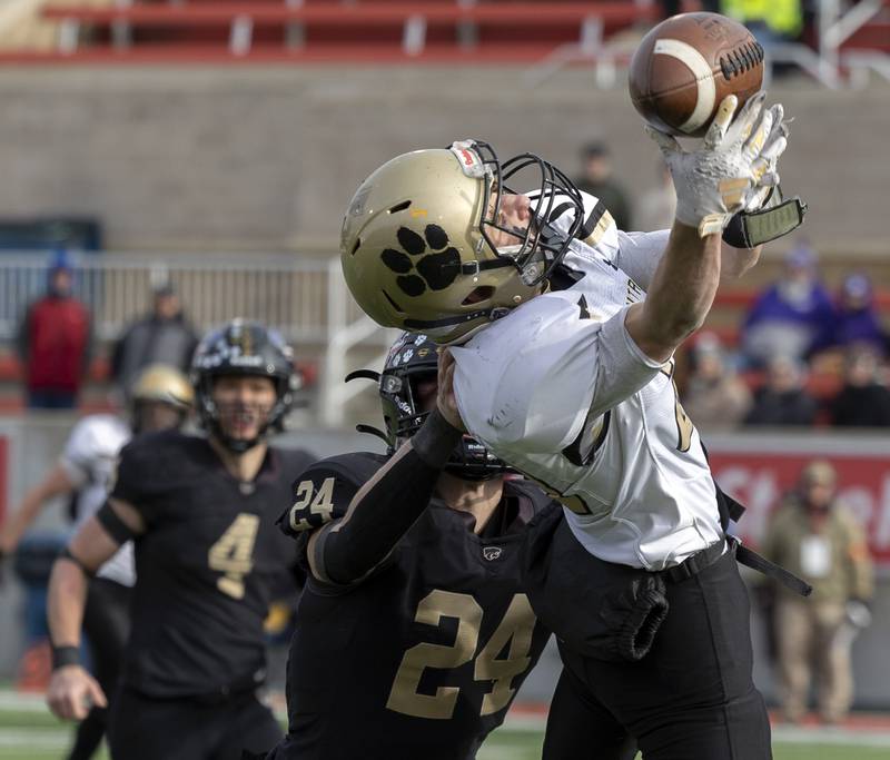 Camp Point's Drew Paben is unable to haul in a pass against Lena-Winslow's Lucas Fye Friday, Nov. 24, 2023 in the 1A state football championship game at Hancock Stadium in Normal.