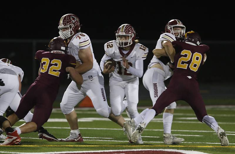 Morris’ Carter Button looks for running room during a Kishwaukee River Conference / Interstate 8 Conference crossover football game Friday, Sept. 30, 2022, between Richmond-Burton and Morris at Richmond-Burton Community High School in Richmond.