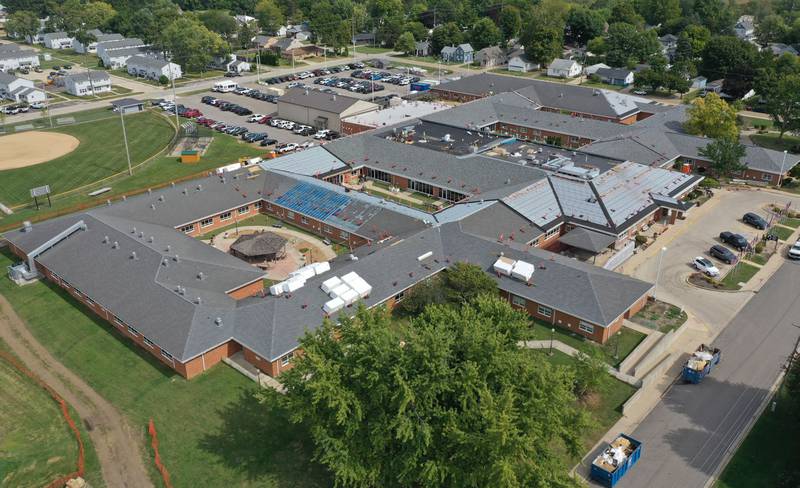 Crews replace the roof on the Illinois Veterans Home on Tuesday, Sept. 23, 2025 in La Salle.