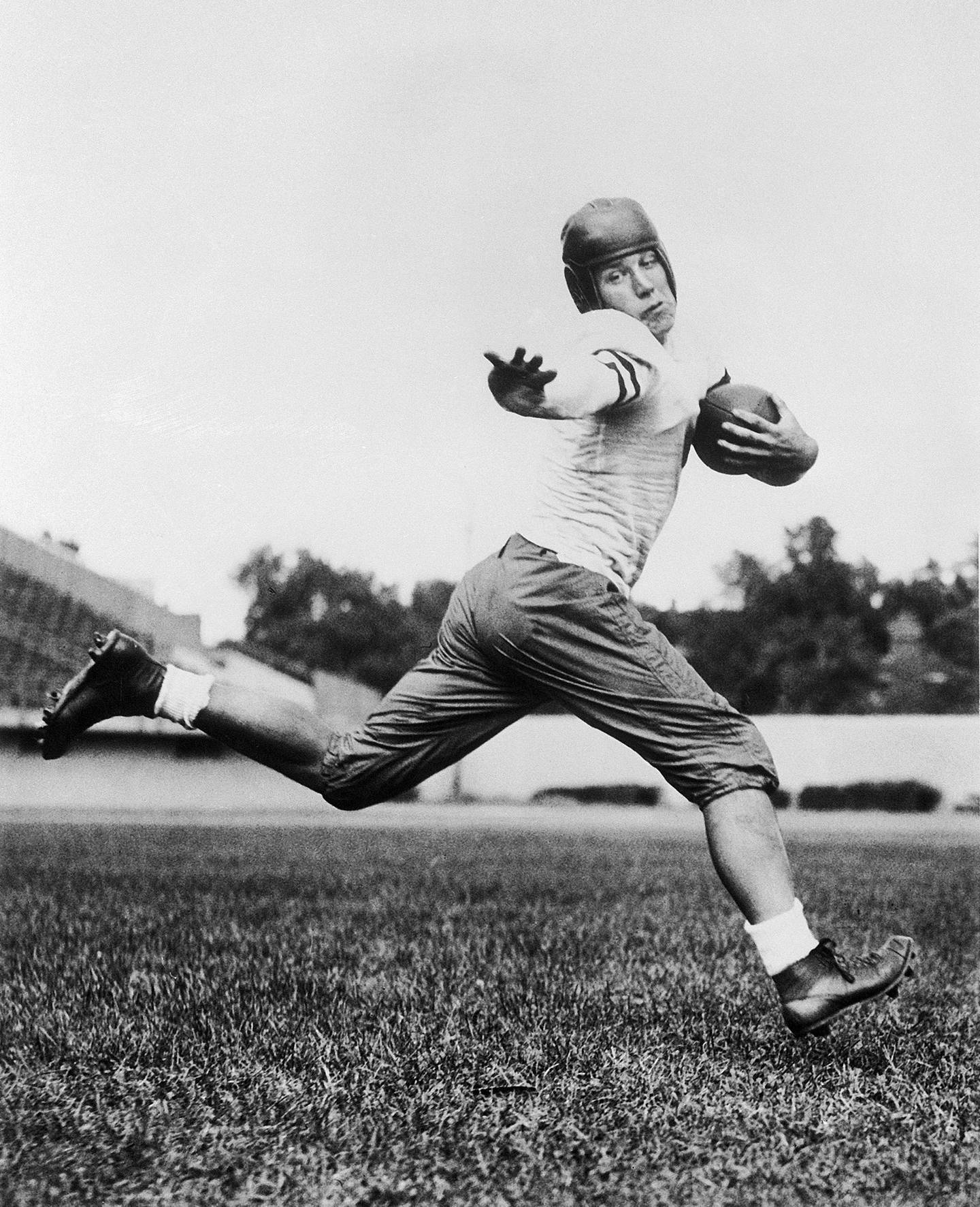 In this 1934 file photo, University of Chicago halfback Jay Berwanger is shown in the action pose that served as the model for the Heisman Trophy. In the early days of the NFL, college football was king, and playing the game professionally was not necessarily something players aspired to do.