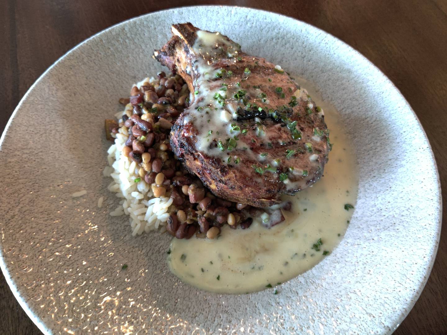 Cajun pork chop at The Graceful Ordinary in St. Charles.