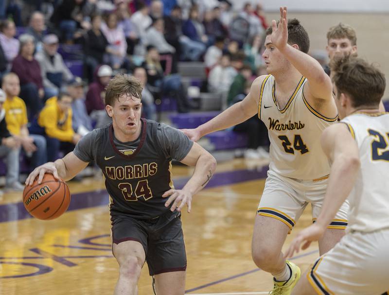 Morris’ Ashton Yard handles the ball against Sterling Wednesday, Feb. 22, 2023 in the 3A sectional semifinal game.