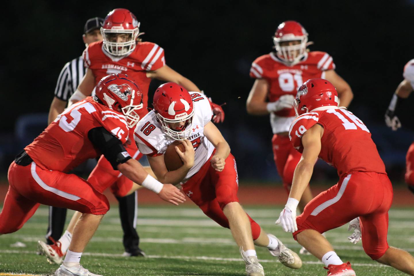 Hinsdale Central's Billy Cernugel (18) scrambles during football game between Hinsdale Central at Naperville Central.  August 26, 2022.