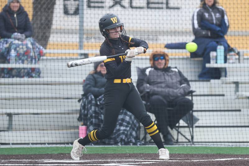 Joliet West’s Mackenzie Mielke drives in a run against Sandburg on Thursday, March 12, 2026 in Joliet.