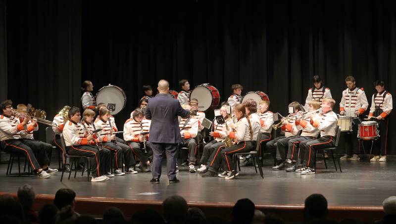 Hall High School marching band plays Armed Forces Medley during the Veterans Day program on Tuesday, Nov. 11, 2025 in the Hall High School