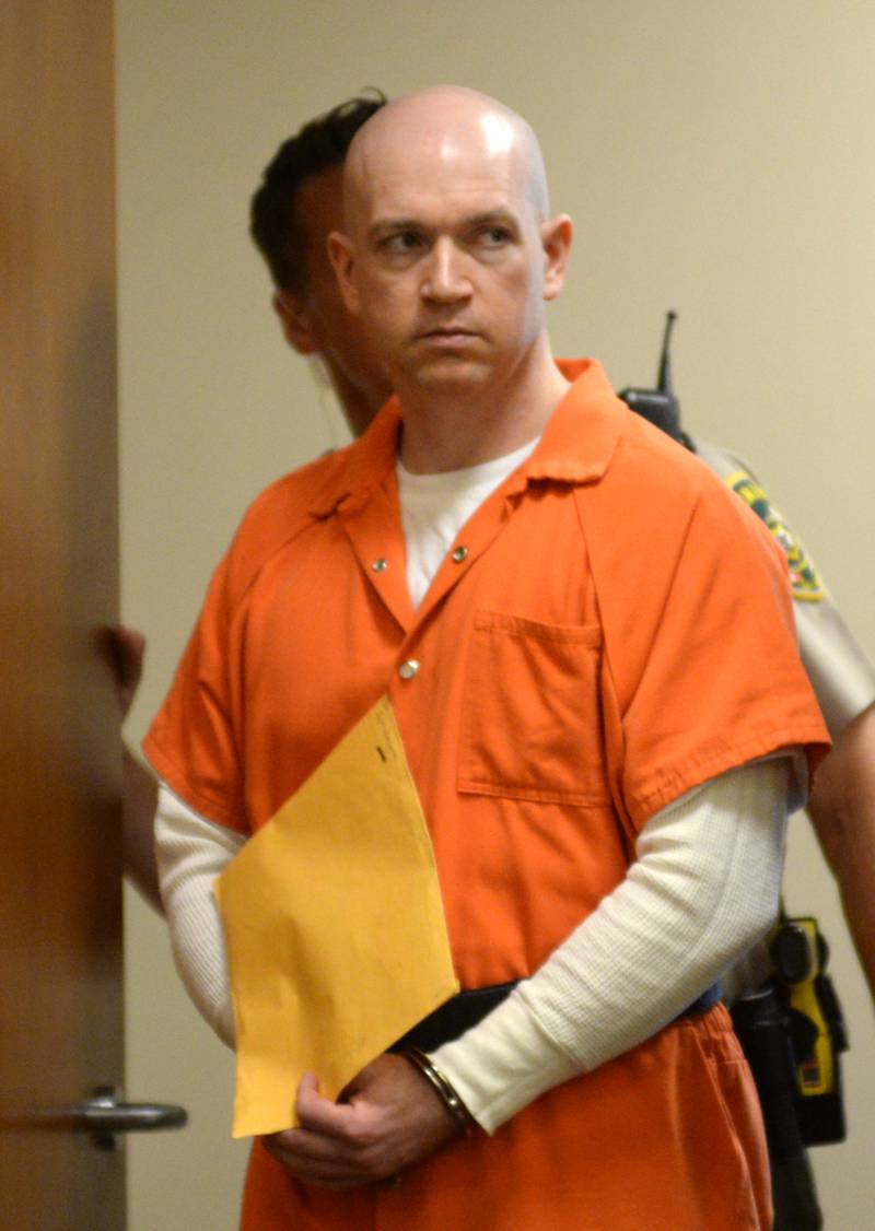 Matthew Plote, 36, of Malta, is escorted into an Ogle County courtroom on Thursday, Sept. 7, 2023.