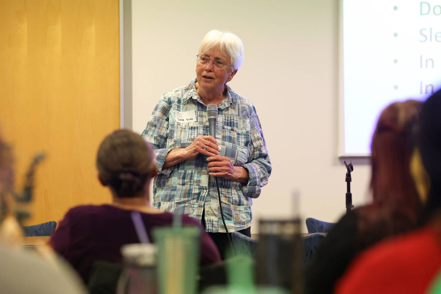 Diane Nilan, author of “The Three Melissas: The Practical Guide to Surviving Family Homelessness,” speaks to attendees during the third annual Kankakee County Summit on Homelessness on Thursday, Nov. 6, 2025, hosted by the Kankakee County Homeless Task Force at Kankakee Community College.