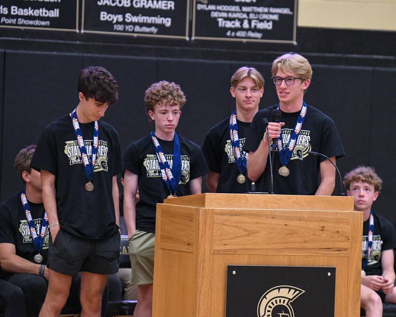 Sycamore’s 4x800 relay Devin Karda, Daiden Von Schnase, Luke Miller, and Corey Goff talks during the pep rally on Tuesday June 4, 2025, at Sycamore High School after the team brought back the championship trophy.