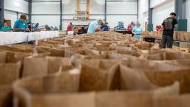 Sherman’s marks 50th anniversary with meal-packing event for hungry children