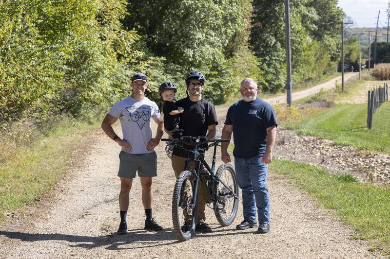Rock River Valley Bike Club members Ryan Elmendorf (left), Scott Fenwick and son Leo and Brian Seagren visit the trails at The Meadows in Dixon Saturday, Sept. 28, 2024.