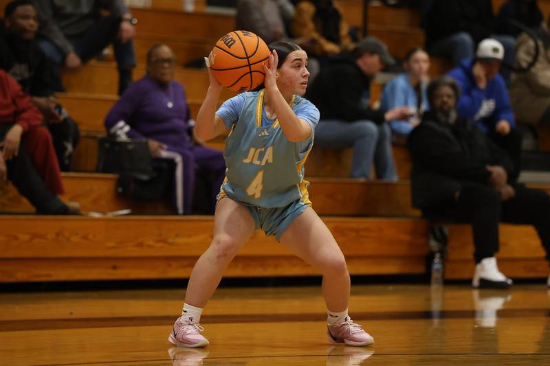 Joliet Catholic’s Lindsy Blabas looks for a play against Marian Catholic on Wednesday, Jan. 14, 2026 in Chicago Heights.