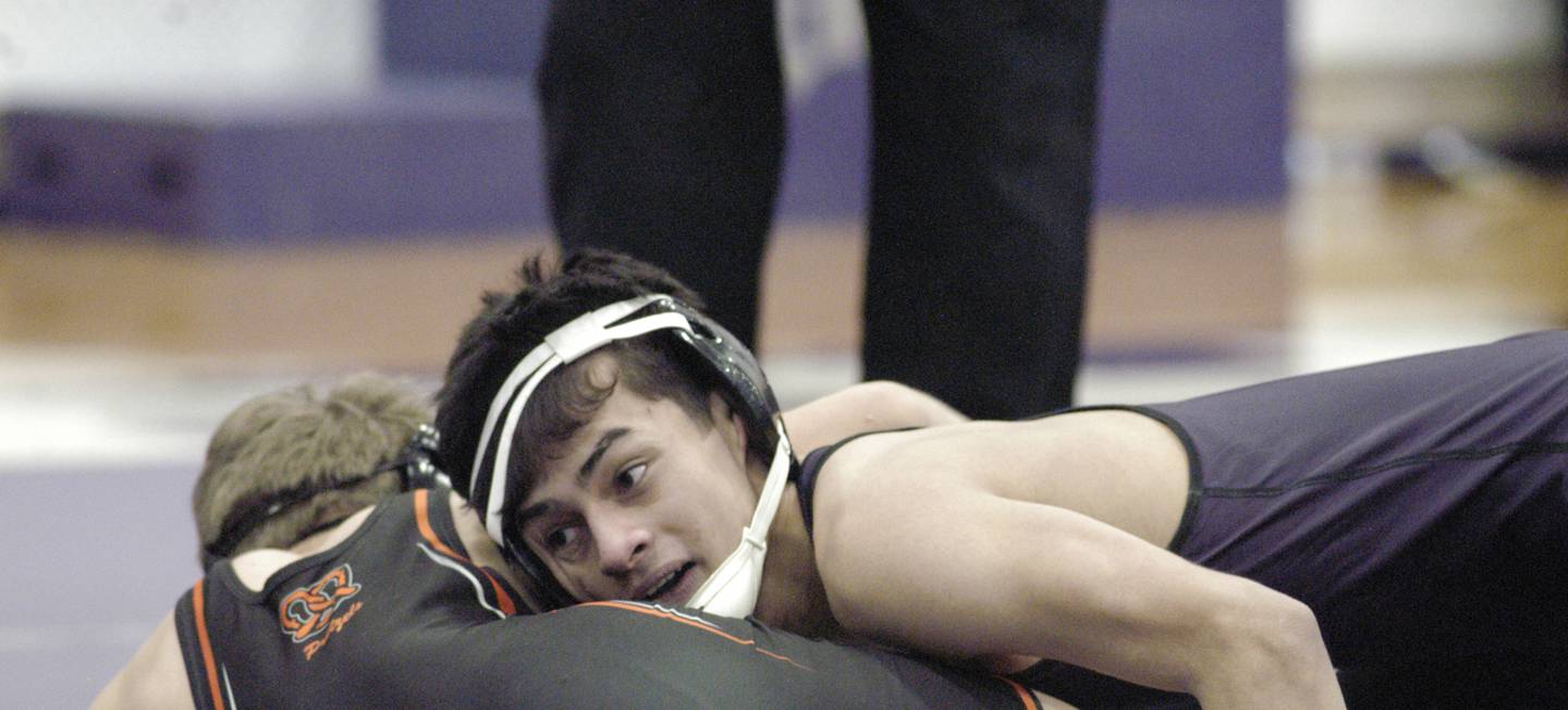 Dixon's Riley Paredes wrestles Freeport's Treyden Diduch in the 106-pound championship bout at the Class 2A Dixon Regional on Saturday, Feb. 8, 2025 at Lancaster Gym in Dixon.
