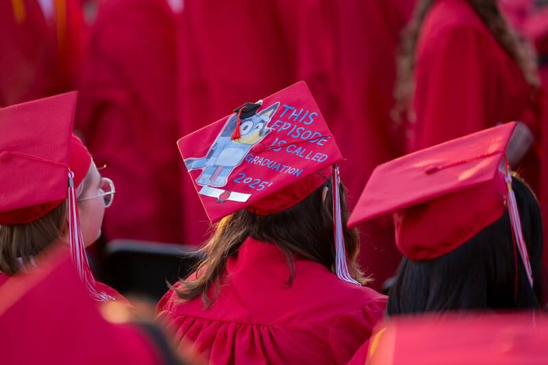 (center) Jessie Miller wears decorated cap on Friday May 23, 2025 at Ottawa High School in Ottawa.