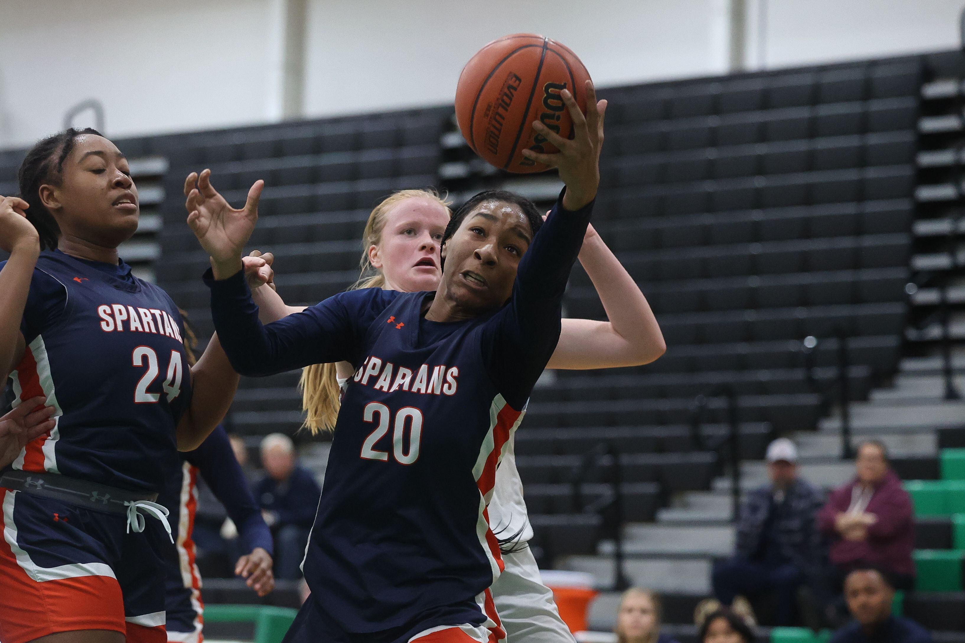 Romeoville’s Laila Houseworth stretches for the rebound against Lockport in the Oak Lawn Holiday Tournament championship on Saturday, Dec.16th in Oak Lawn.