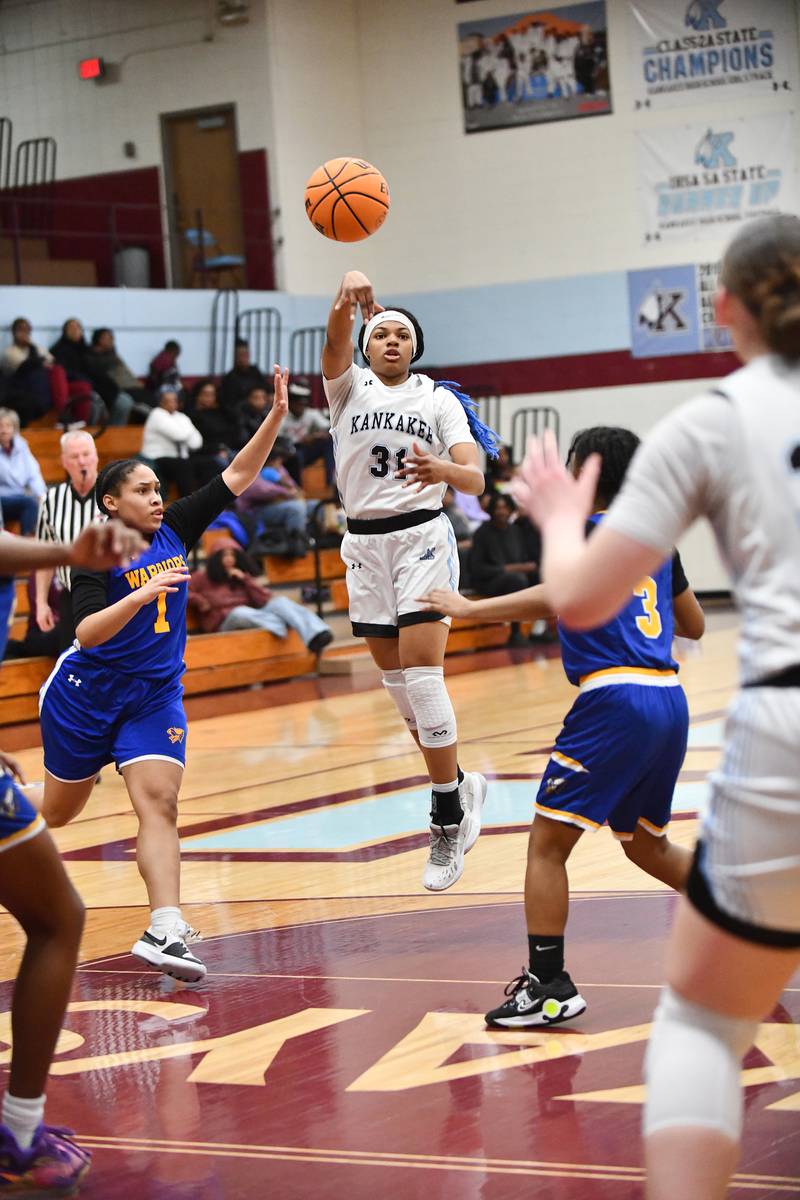 Kankakee's TaLeah Turner passes to teammate Ava Johnson on Thursday, Feb. 6, 2025, during the Kays' victory over Crete-Monee.