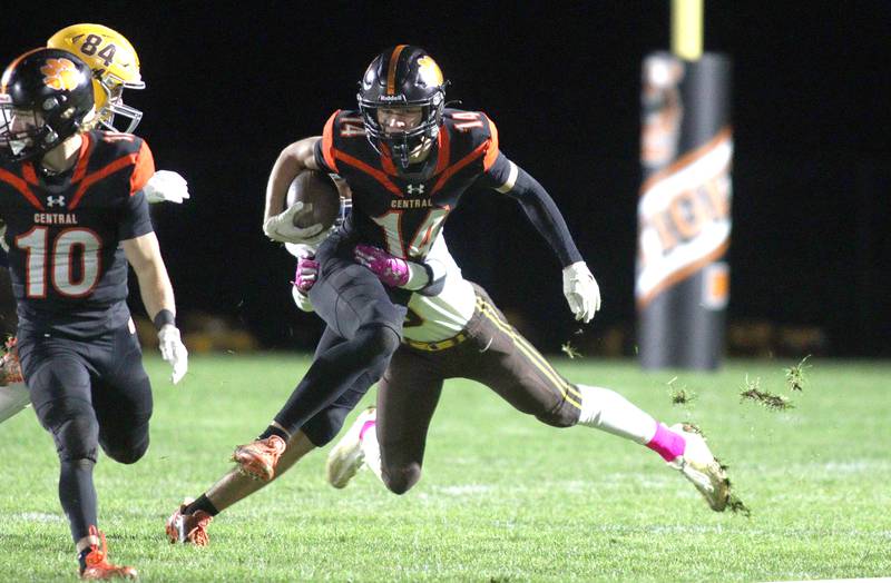 Crystal Lake Central’s George Dimopoulos picks up some yardage against Jacobs in varsity football at Metcalf Field on the campus of Crystal Lake Central Friday night.
