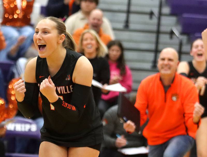 Mairead Fleming, left, and Libertyville’s Wildcats celebrate a two-set win in an IHSA volleyball Class 4A Sectional Championship at Hampshire High School in Hampshire on Thursday, November 6, 2025.