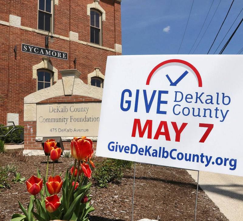 A sign outside the DeKalb County Community Foundation building in Sycamore Wednesday, May 6, promotes the Give DeKalb County event.