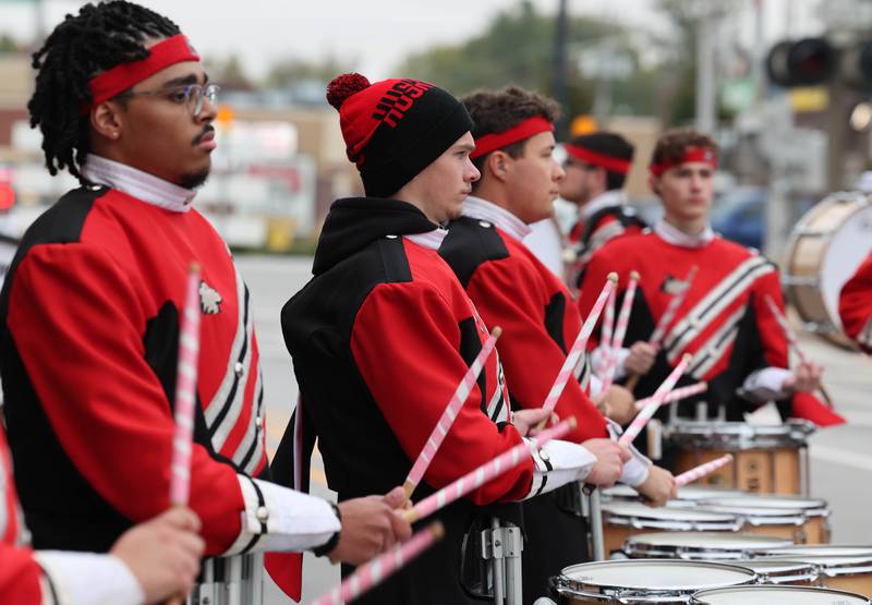 The Northern Illinois University marching band drumline performs during the NIU Huskie Homecoming Block Party Thursday, Oct. 12, 2023, in downtown DeKalb.