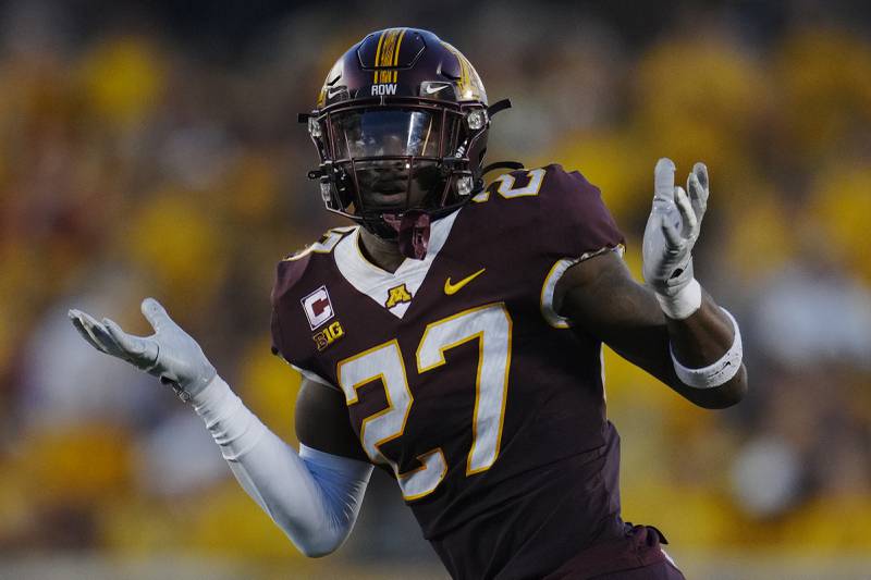 Minnesota defensive back Tyler Nubin (27) celebrates after intercepting a pass during the first half of a 2023 NCAA college football game against Nebraska in Minneapolis. (AP Photo/Abbie Parr)