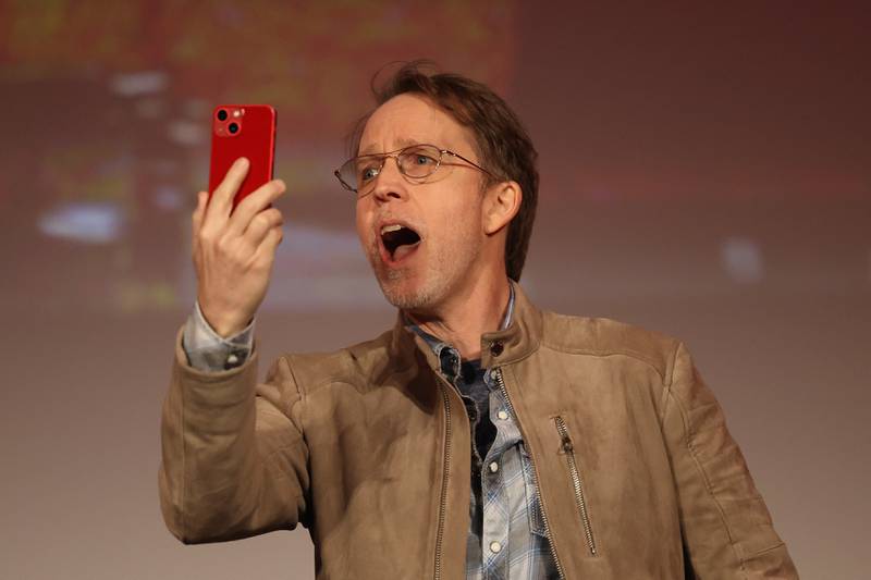 Actor James Arnold Taylor, who did the voice of Obi-Wan Kenobi, takes video of the crowd as he takes the stage at the Star Wars Clone Wars: Animation Series 15 year cast reunion panel at C2E2 Chicago Comic & Entertainment Expo on Saturday, April 1, 2023 at McCormick Place in Chicago.
