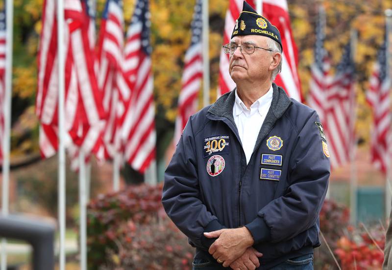Steve Korth, a US Army veteran and member of the Rochelle American Legion Post 403, listens to speakers Friday, Nov. 4, 2022, during the DeKalb County Courthouse 24 Hour Veterans Vigil opening ceremony. A veteran will stand guard at the courthouse starting at 4:00 pm Friday through 4:00 pm Saturday in honor of the upcoming Veterans Day.