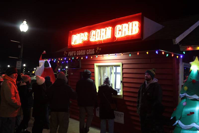 Pop's Corn Crib opens up for its first day with new owners during the Downtown Crystal Lake Festival of Lights Parade on Nov. 28, 2025.