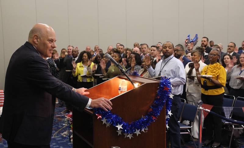 Postmaster General Louis DeJoy gives the Oath of Office in Chicago to 120 newly named postmasters.
