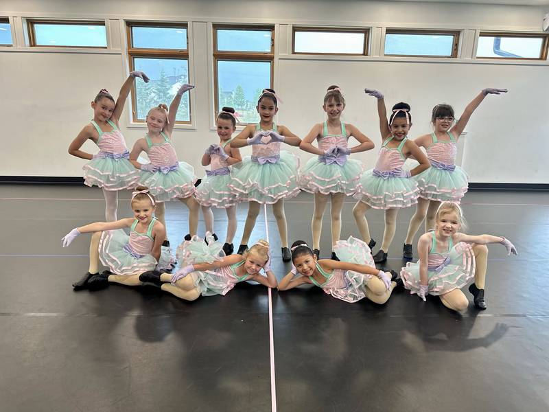 Performers of Ultimate Dance on the Move in Plano strike a pose. The studio trains dancers in styles as  diverse as ballet, hip hop, jazz, lyrical, and tumbling. The business recently moved into a new two-room studio at 11000 U.S. Route 34, Plano.