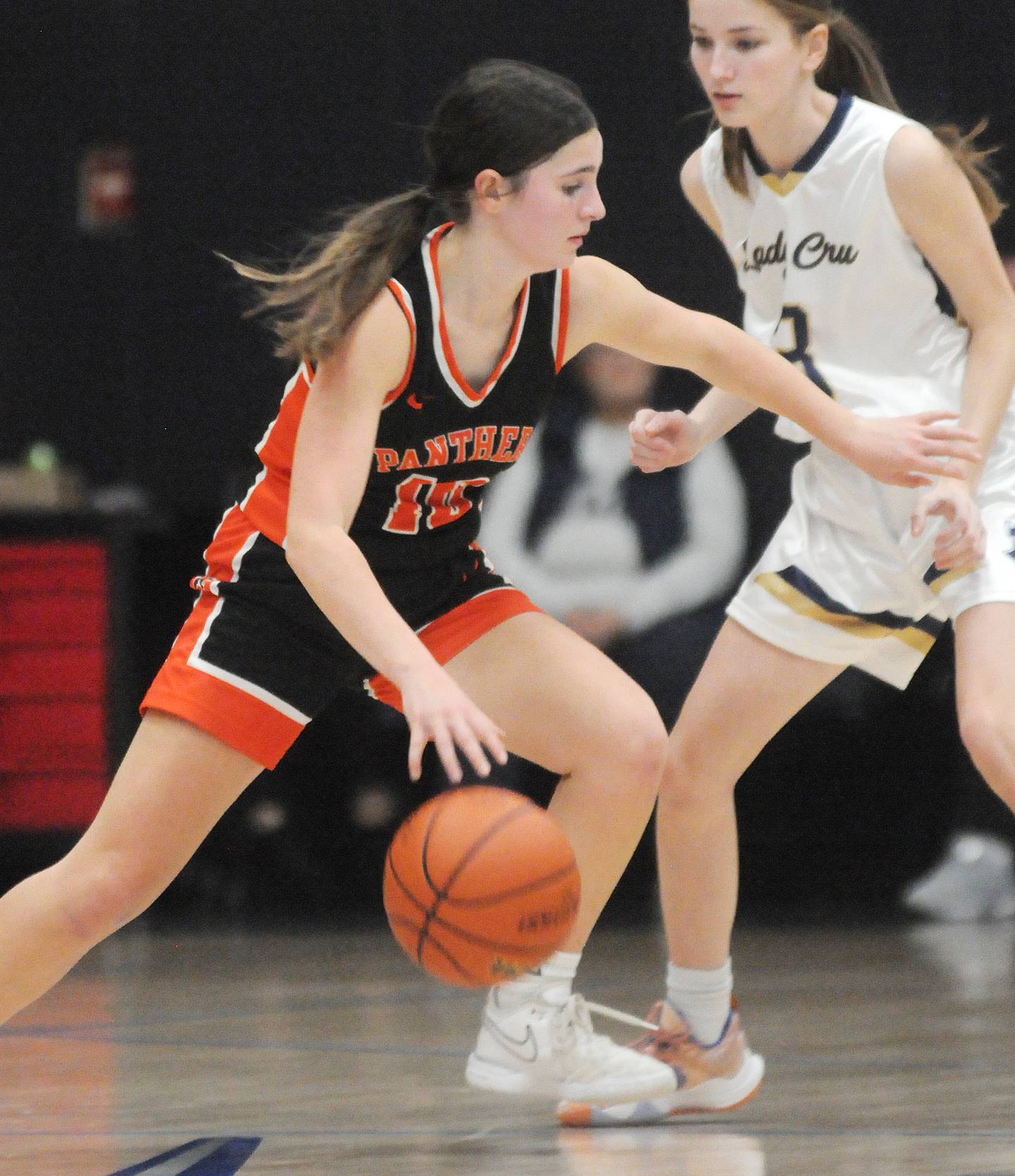 Gardner-South Wilmington's Garce Olsen (10) dribbles as Marquette's Morgan Nelson guards her at Bader Gym on Saturday, Feb. 10, 2024.