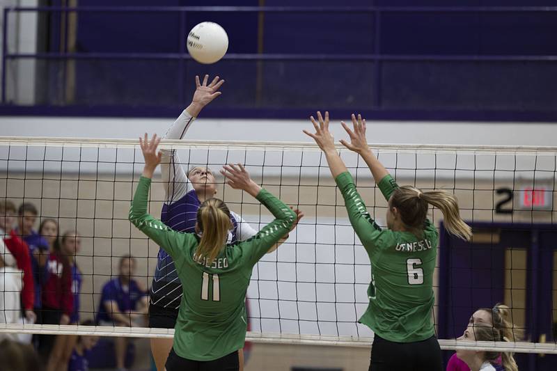 Dixon’s Olivia Cox works the net Monday, Oct. 17, 2022 against Geneseo.