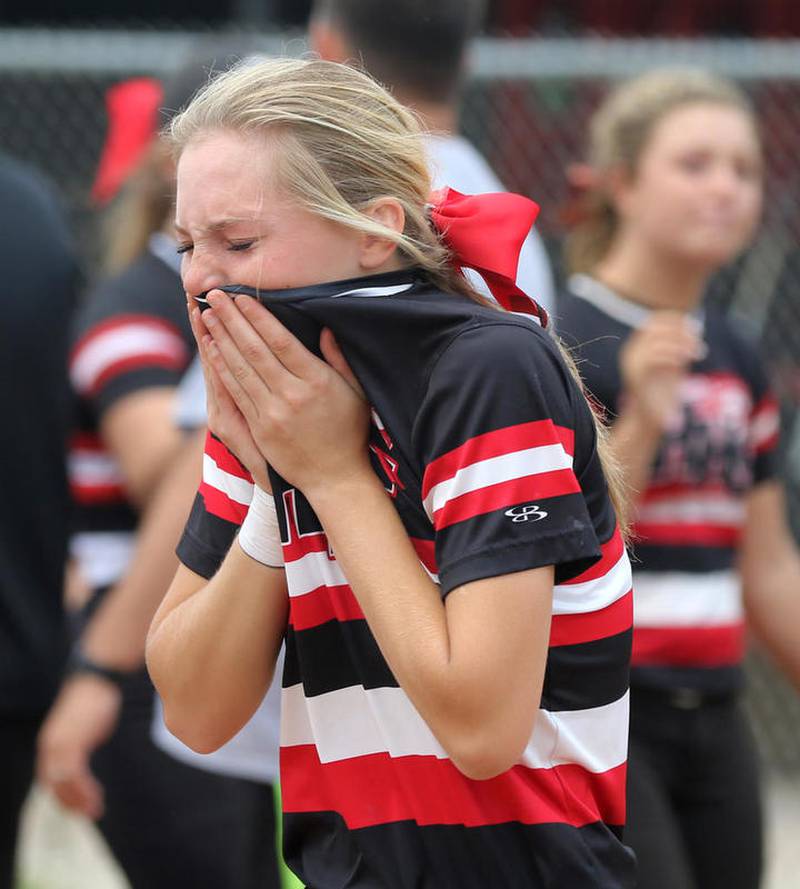 Huntley senior Autumn Kasal wipes away tears after striking out against Barrington to end the Class 4A Huntley Sectional championship Saturday, June 2, 2018. Huntley lost, 5-3, to end its season for the third straight year against Barrington.