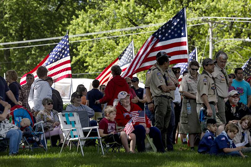 A crowd gathers on the lawn of Oakwood Cemetery Monday, May 27, 2024 in Dixon for the start of a Memorial Day ceremony.