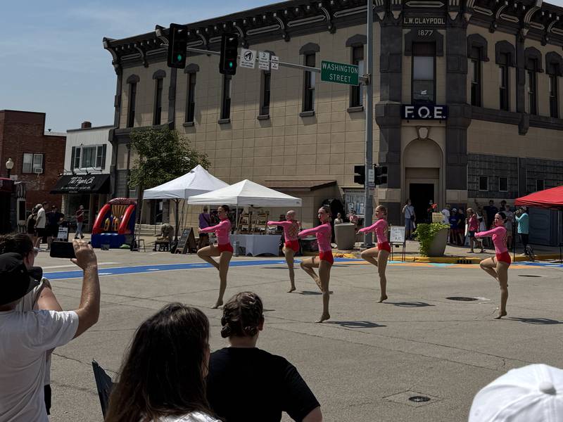 The Pizzaz Dancers from Donna Mueller's School of Dance perform at the corner of Liberty and Washington Streets in Morris on Saturday, Aug. 16, 2025.